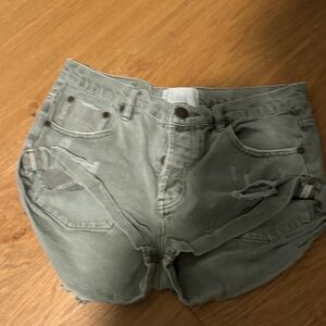 One Teaspoon Olive Green Distressed Jean Shorts.